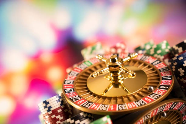 Mobile phone displaying live casino interface with multiple table options